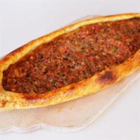 40. Cheese and Ground Meat Pide · Flat bread topped with ground meat spices and Turkish kashar cheese.