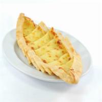 41. Cheese Pide · Kasseri. A flat bread stuffed with Turkish kashar cheese.