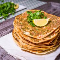 lahmacun · Turkish style pizza - Flat bread topped with ground lamb and chopped garden vegetables. (Min...