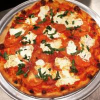 Margherita Pizza · Fresh mozzarella, sliced tomatoes, sauce, and basil.