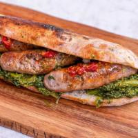 Salsiccia and Friarelli Panozzo · Sweet sausage and broccoli rabe with melted provolone.