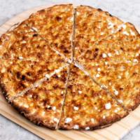 Focaccia Robiola · Thin focaccia bread filled with robiola cheese then topped with a drizzle of white truffle o...