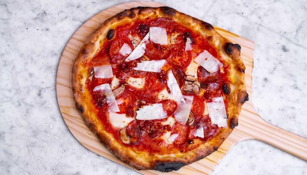 Comma Picca Pizza · Tomato sauce, fiordilatte mozzarella, ‘nduja, raw mushrooms, sliced fresh tomatoes, sliced spicy salame and shavings of Pecorino Romano