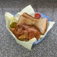 Pork Chop Basket · Come with 2 pork chops, fries, buttered toast, pickles, peppers, hot sauce and ketchup.