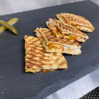 Roasted-Pulled Lamb Meat Panini · Roasted-pulled lamb meat, onions, shredded mozzarella cheese and arugulas.( served with spic...