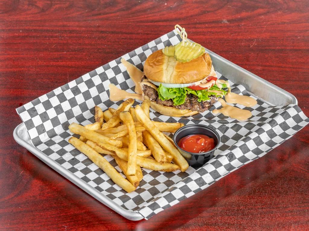 Grass fed Wagyu Buff Burger W Fries ·  Fire grilled grass fed Wagyu beef patty, house sauce, tomatoes, lettuce, onions, pickles,  on a toasted brioche bun served with fries.