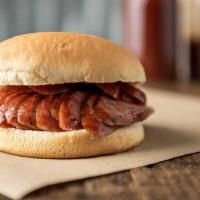 Smoked Sausage BBQ Sandwich · Simple smoked sausages to perfection and served between toasted buns.