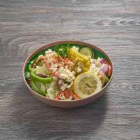 Regular Greek Salad · Mixed lettuce, green pepper, tomato wedges, red onion, cucumbers, Kalamata olives, pepperonc...