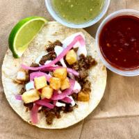 Beef SUJUK Taco · SUJUK is a Mediterranean spice mix added to minced beef, like Chorizo, on a double corn tort...