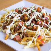 Carne Asada fries  · Delicious fries with carne asada,pico de Gallo mix with Chile Serrano and sour-cream  