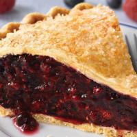 Triple Berry Pie  · Tart raspberries, plump, wild Maine blueberries, and juicy Pacific Northwest blackberries bl...
