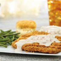 ½-lb. Chicken-Fried Steak. · Smothered in country gravy and served with a buttermilk biscuit, mashed potatoes and choice ...