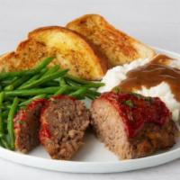 All-American Meatloaf Dinner · Served with mashed potatoes and choice of side.