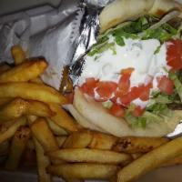 Lamb Gyro Deluxe · Lettuce, tomatoes, onions and tzatziki sauce.