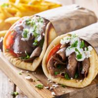 Beef Gyro · Homemade beef with lettuce, tomato, onions and white sauce.