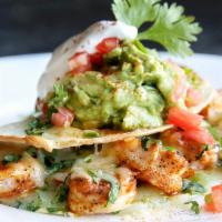 Shrimp Quesadilla · Fresh-grilled shrimps, onions, peppers, spinach, mozzarella and pepper Jack cheese.