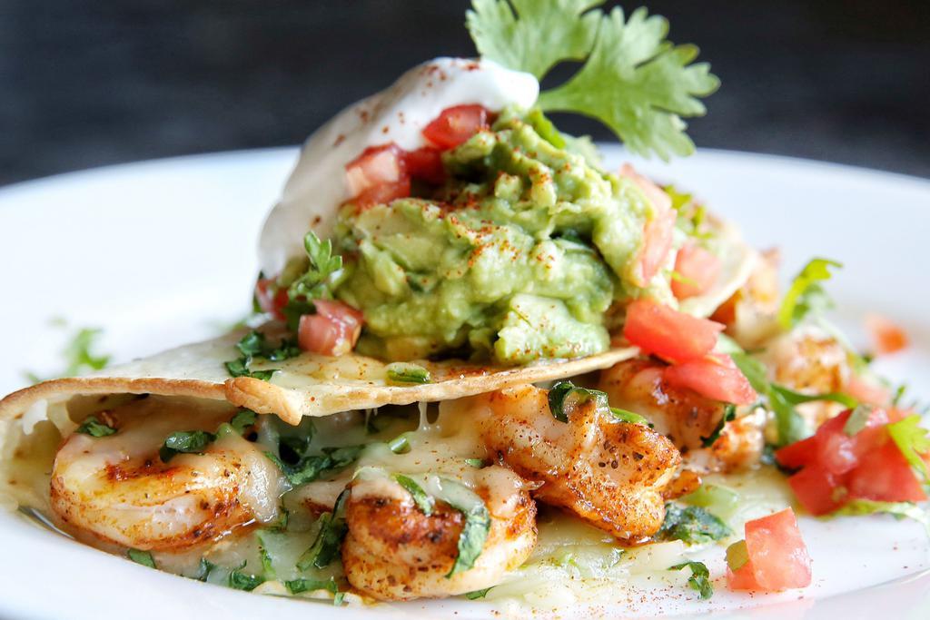 Shrimp Quesadilla · Fresh-grilled shrimps, onions, peppers, spinach, mozzarella and pepper Jack cheese.