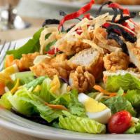 Crispy Chicken Cobb Salad · Chicken cutlet, boiled egg, cheddar cheese, tomato, bacon bites, ranch dressing and romaine ...
