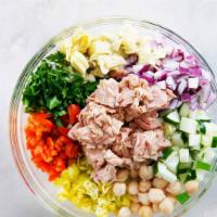 Tuna salad  · Fresh tuna . Romain lettuce .tomatoes ,red onion olives and balsamic dressing 