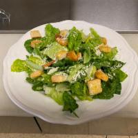 Caesar Salad · Romaine lettuce and croutons with Caesar dressing.