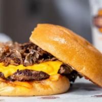 11. Philly Burger (4 oz.) · Philly steak, sautéed onions, American cheese, ketchup, and mayo on a fresh baked deli bun.
