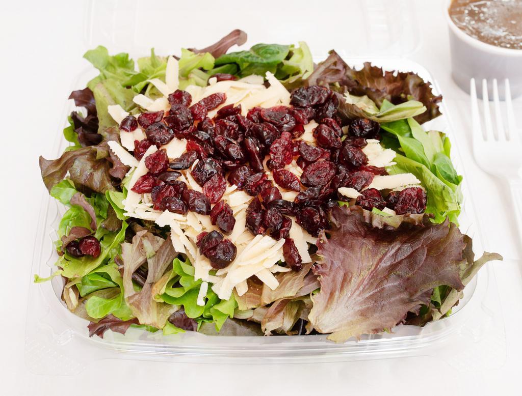 A4. Mesclun Salad with Goat Cheese · Mesclun leaves, goat cheese, caramelized walnuts and dried cranberries.