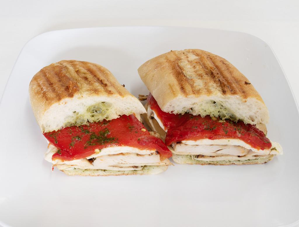 B19. Grilled Chicken Pesto Sandwich · Grilled chicken, fresh mozzarella, roasted peppers and homemade basil pesto.