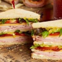 The King · Turkey, Swiss Cheese, lettuce and tomatoes and honey mustard served on a hero.