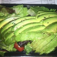 Avocado Salad · Sliced avocado with a variety of vegetables. 