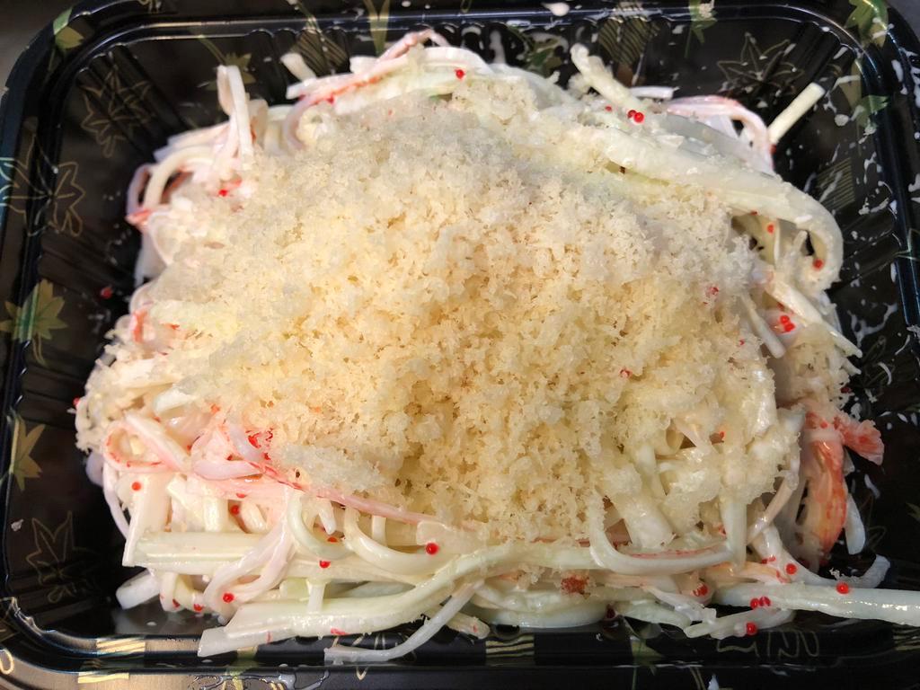 Kani Salad · Cucumber and crabmeat mixed with mayo, masago and crunch on the top.