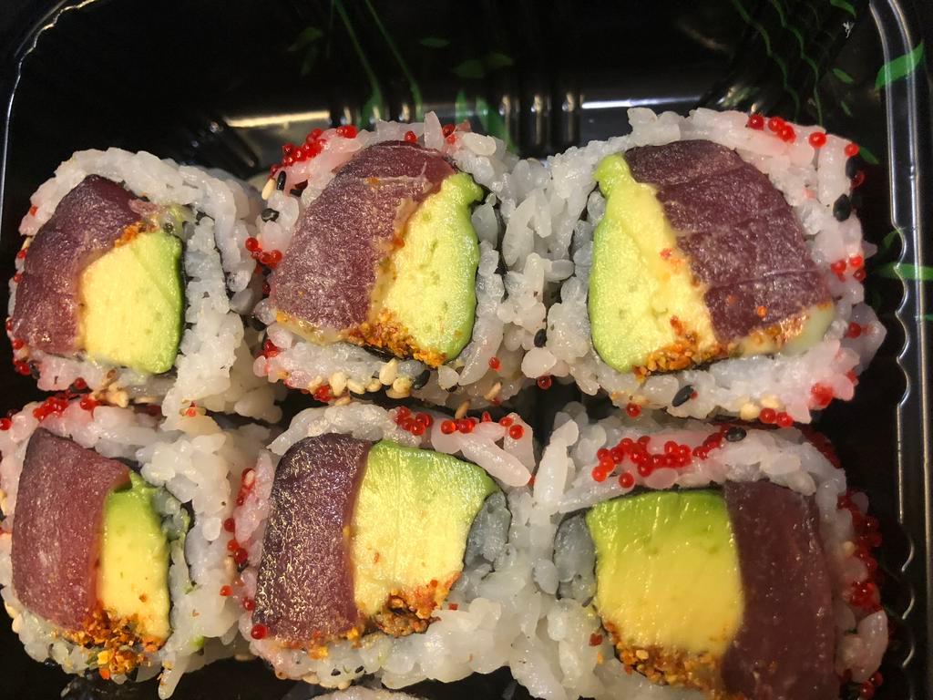 Pepper Tuna Roll · Served with avocado, scallion and tobiko with wasabi honey sauce.