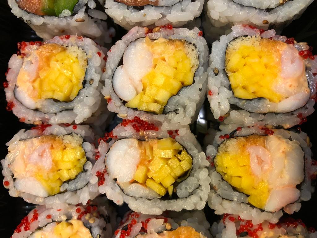 Spicy Mango Shrimp Roll · Served with tobiko and crunch.