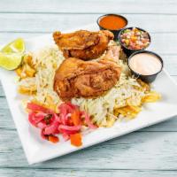 23. Pollo con Tajadas · Fried chicken, fried green plantains, salad and cabbage.