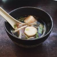A27. Shumai Soup · Clear broth with shrimp dumpling and vegetables.