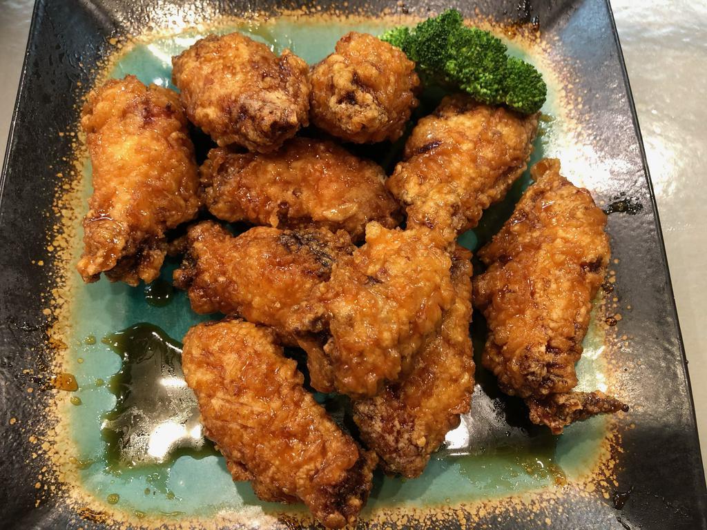 Soy Garlic and Spicy Fried Chicken · 8 pieces of fried chicken wings marinated in soy and garlic