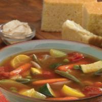 Hearty Vegetable Soup Bowl · Served with our famous golden cornbread. Vegetarian.