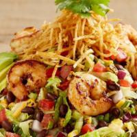 Southwest Avocado with Ancho-Marinated Shrimp Salad · Iceberg, romaine, carrots, red cabbage, a blend of three cheeses and tortilla strips tossed ...