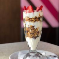 Yogurt Parfait · Organic vanilla yogurt, housemade granola and strawberries.