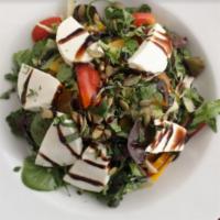 Beet Mozzarella Salad · Golden beets, fresh mozzarella, fennel, red onions, grape tomatoes, organic greens, balsamic...