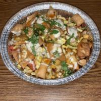 Chaat Papri · Garbanzo beans with fresh onions, green peppers, fresh tomatoes, and cilantro. Served with t...