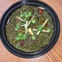 Bone-In Goat and Spinach Curry · Made Using Bone-In Goat Meat, Spinach, Onions, Yogurt, Tomatoes, Ginger- Garlic Paste, Cilan...