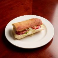 Ham and Provolone Sandwich · Choice of homemade bread or regular bread. All sub sandwiches come with lettuce, tomatoes, o...