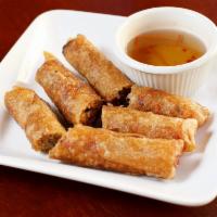Imperial Rollz · Crispy fried rolls filled with ground pork, taro, carrots, and silver noodles.