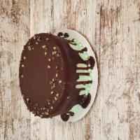 Mint Cake · Chocolate cake with mint buttercream icing, topped with chocolate drizzle and crushed mints.