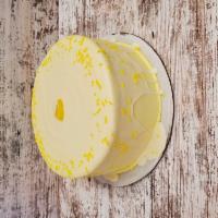 Lemon Cake · Lemon cake with lemon buttercream icing, topped with a lemon candy.