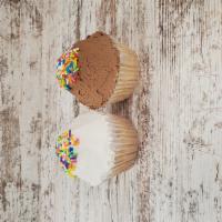 White Cupcake · White cake with your choice of white or chocolate buttercream icing topped with sprinkles.