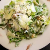 Caesar Salad · Crisp romaine lettuce, croutons, Romano cheese and Caesar dressing. 