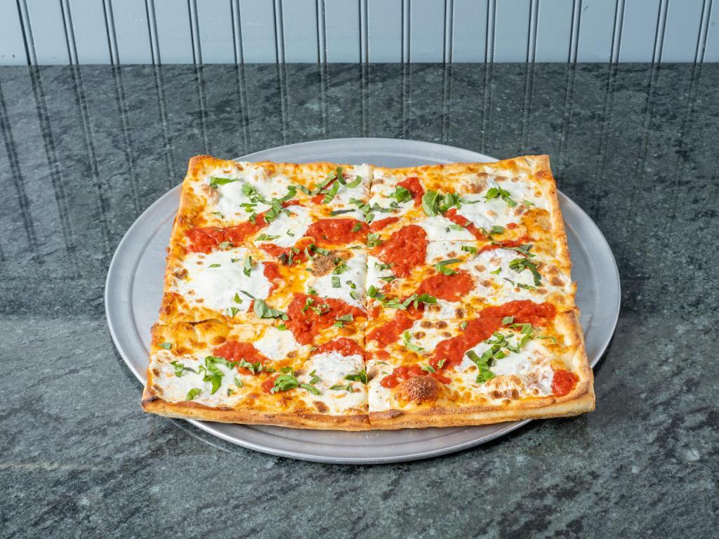 Grandma Pizza · Thin crust Sicilian pizza with imported San Marzano tomato sauce, mozzarella and basil. 