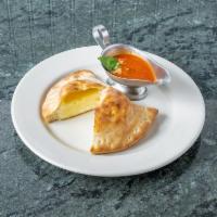 Cheese Calzone · Stuffed folded pizza pocket. Add toppings for an additional charge.