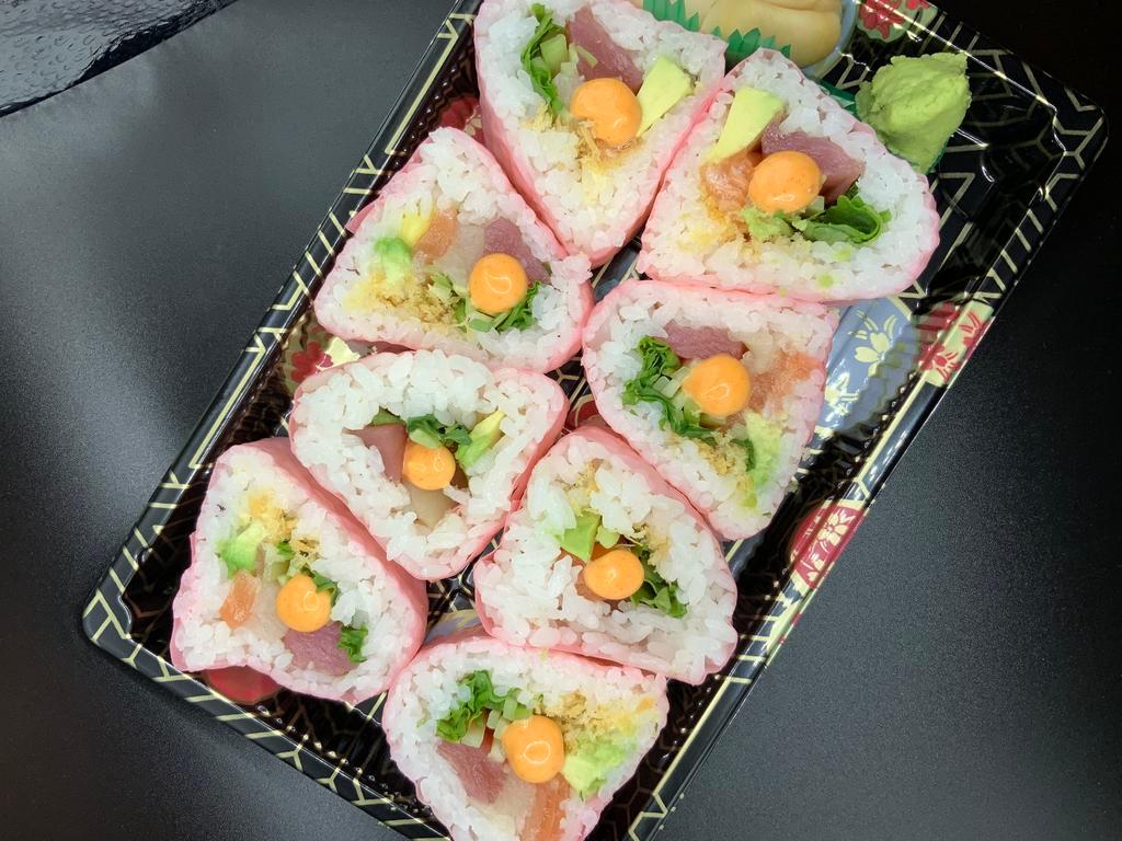 8 Pieces Fashion Roll · Tuna, salmon, yellowtail, lettuce, avocado, cucumber, tempura crunch and mayo wrapped with soy paper.
